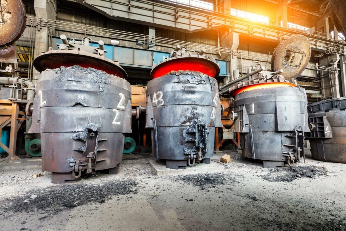 Stock photo. Steel ladles are preheated before use.